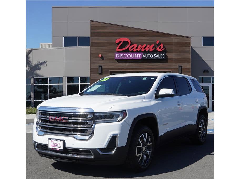 2023 GMC Acadia SLE in Summit White — front three-quarter view