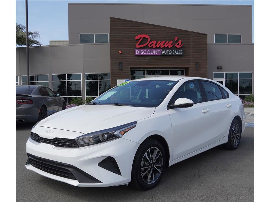 2023 Kia Forte LXS in Snow White Pearl — front three-quarter view