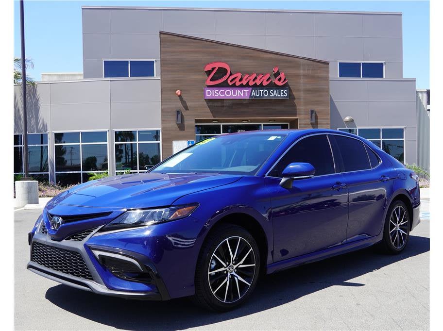 2023 Toyota Camry SE Sedan 4D in Blue — front three-quarter view