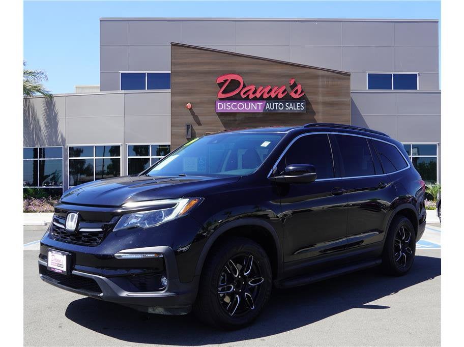 2019 Honda Pilot EX-L in Black — front three-quarter view