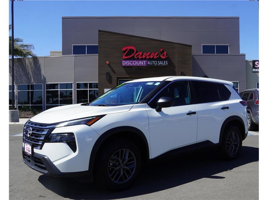 2024 Nissan Rogue S in Glacier White — front three-quarter view