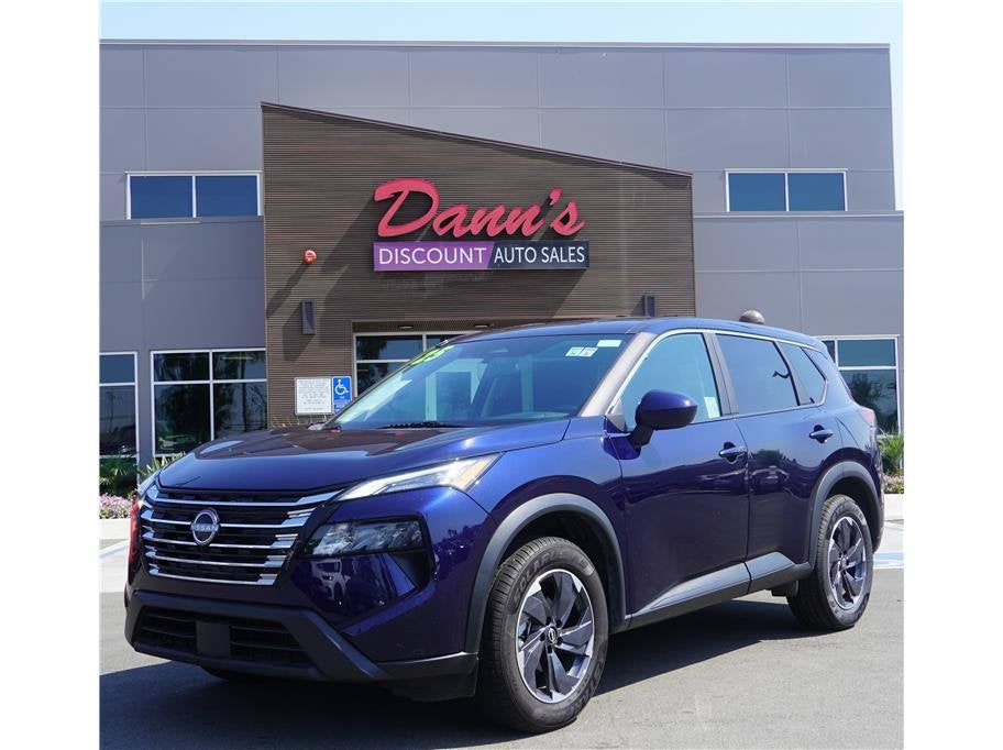 2025 Nissan Rogue SV in Deep Ocean Blue Pearl — front three-quarter view