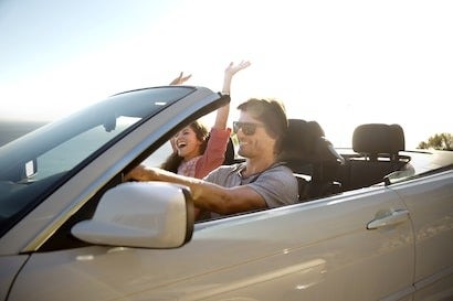 image of a couple in a convertible